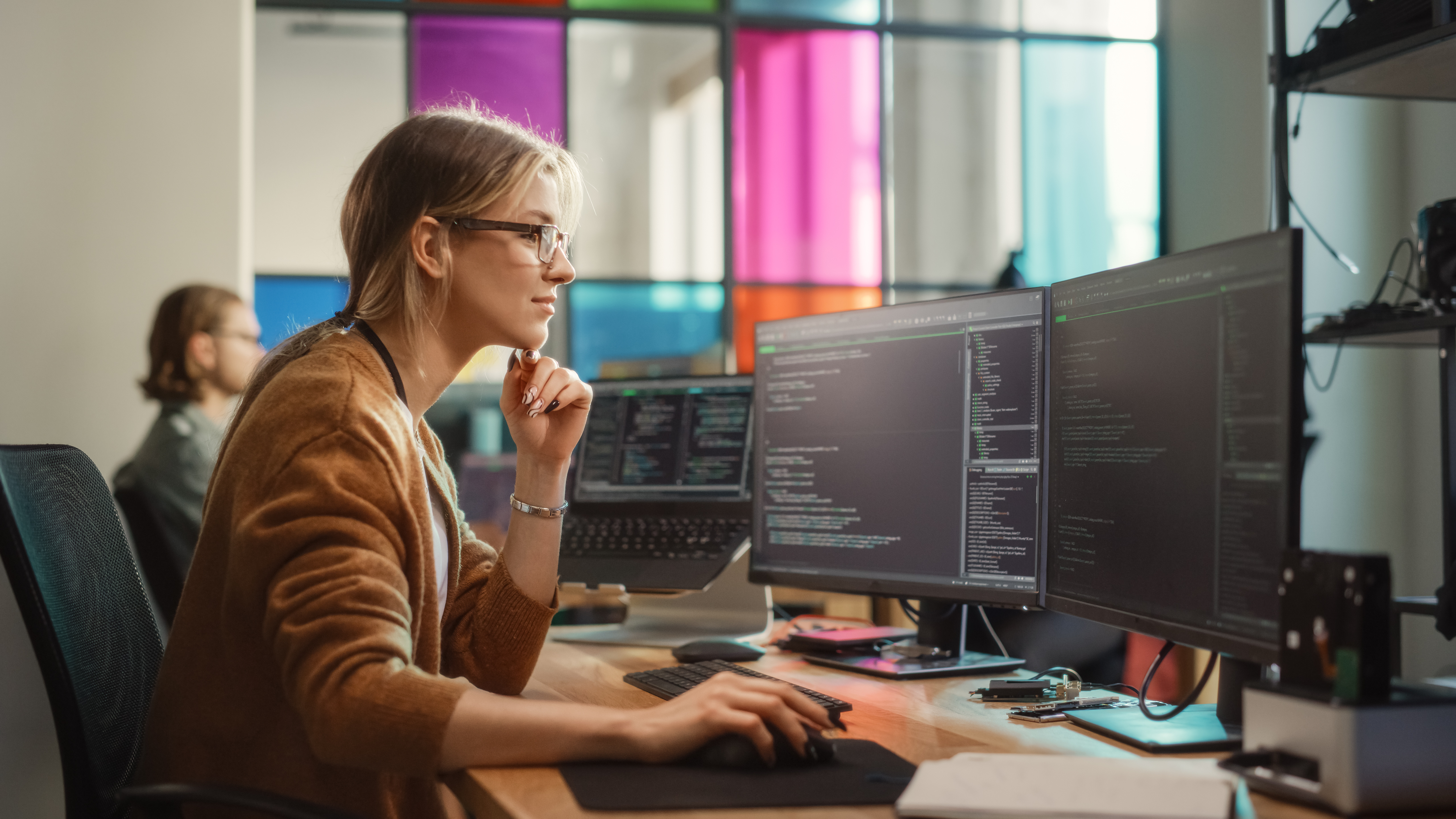 woman software engineer looking at computer